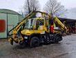 Zweiwege Unimog mit Frontausleger / Mulcher / Astschere