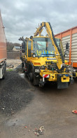 Zweiwege Unimog mit Frontausleger / Mulcher / Astschere